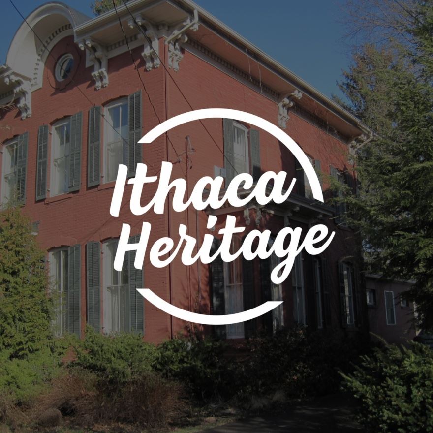 Circular text area that reads ”Ithaca Heritage” overlaid over an image of the henry st john building.