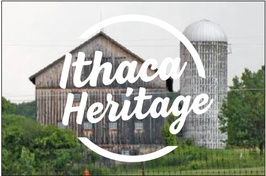 Circular text area that reads ”Ithaca Heritage” overlaid over an image of a barn.