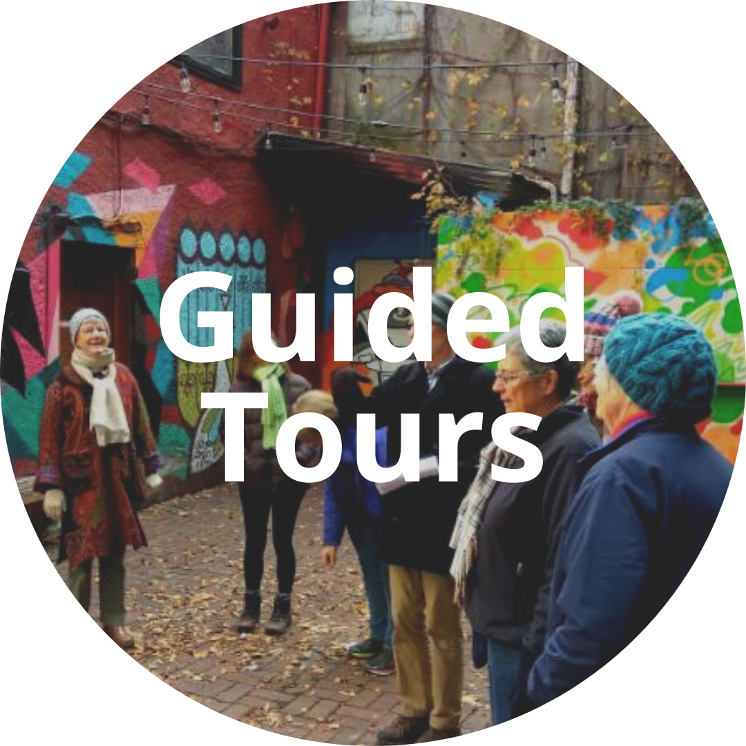 Circular image, text button "Guided Tours"