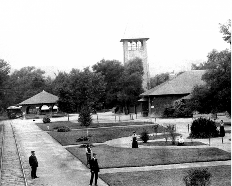 Circular text area that reads ”Ithaca Heritage” overlaid over a black and white image of stewart park.